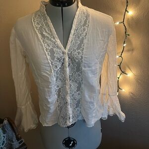 Cream, lace, long sleeve blouse.